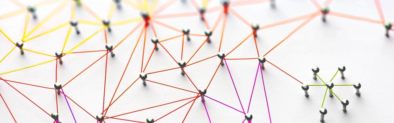 Pins connected by colorful string