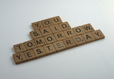 Scrabble pieces that read you said tomorrow yesterday