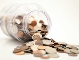 Spilled jar of coins