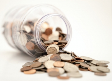 Spilled jar of coins